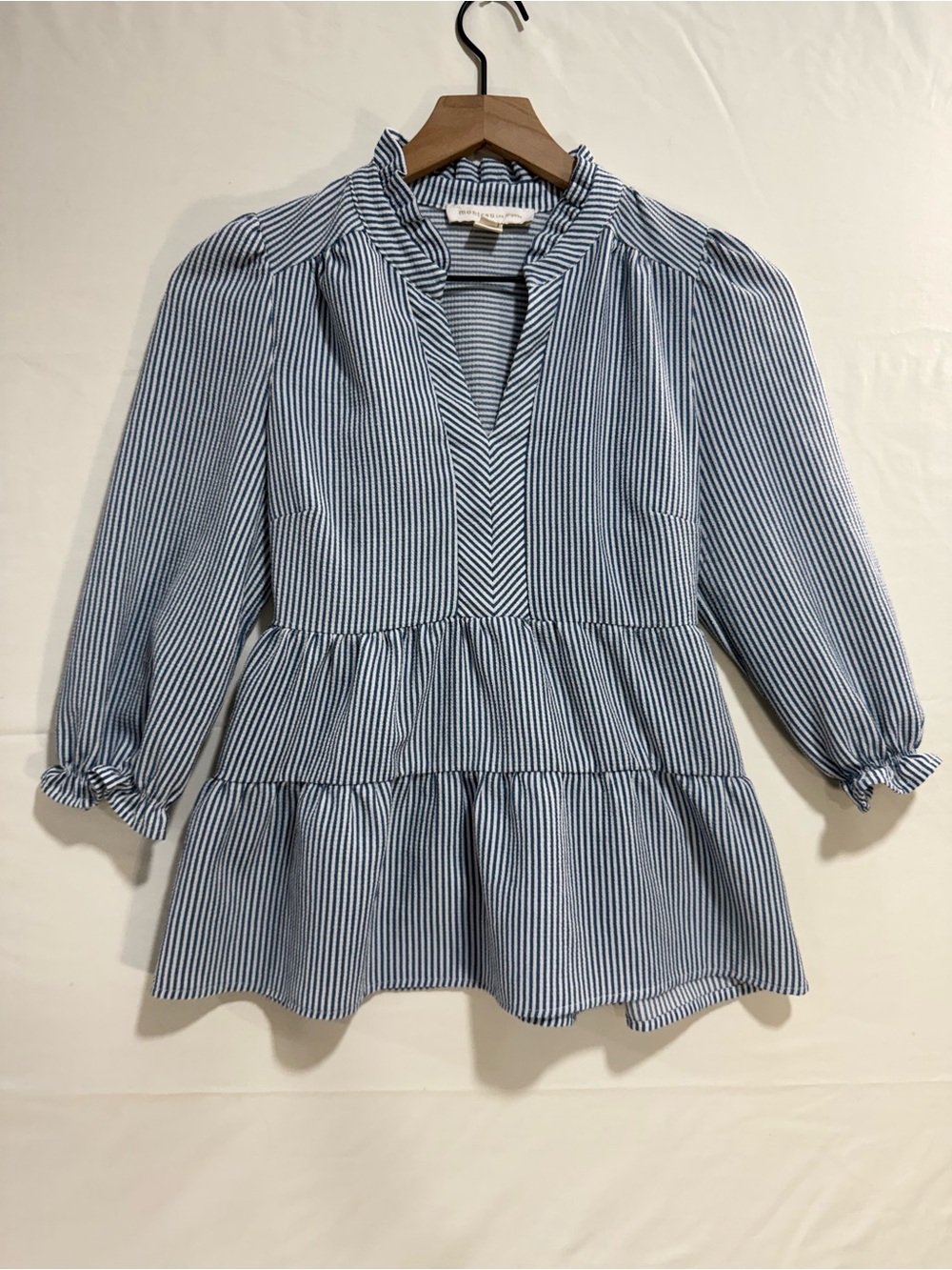 Striped Blue Peplum Blouse with V-Notch Neckline